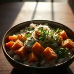 purple tofu pilaf with roasted sweet potato, brown rice, and sardinian herbs in a rustic esoterris bowl. purple tofu pilaf with roasted sweet potato, brown rice, and sardinian herbs in a rustic esoterris bowl.